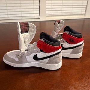 Air Jordan Nike High-Tops with Red, Black, and White Design